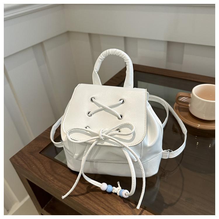 Ballet style bow backpack women 2025 new Internet celebrity portable small backpack go shopping travel small schoolbag