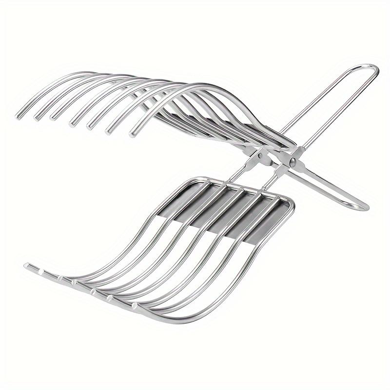 A Stainless Steel Beef Slicing Tongs For Cutting Meat And Bread Slices, Onion And Tomato Clip, Used For Cutting Vegetables And Fruits In The Kitchen.