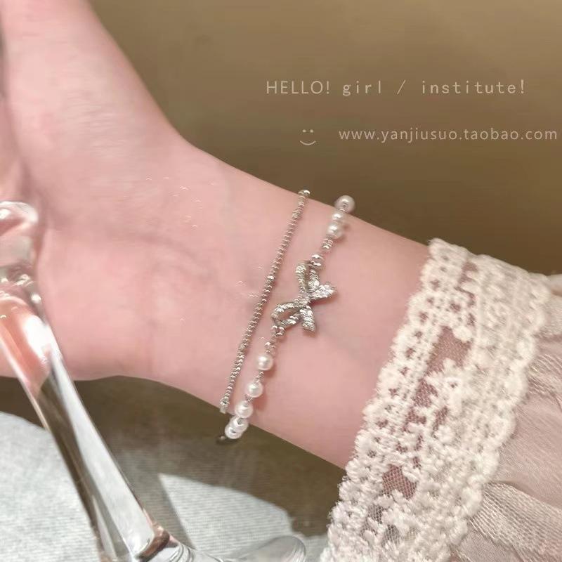 Double bow pearl stacked bracelet light luxury niche exquisite bracelet accessories student high value jewelry gift
