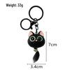 Bedårande 3D Kattnyckelringshänge med Stora Ögon i Harts för Bil eller Ryggsäck