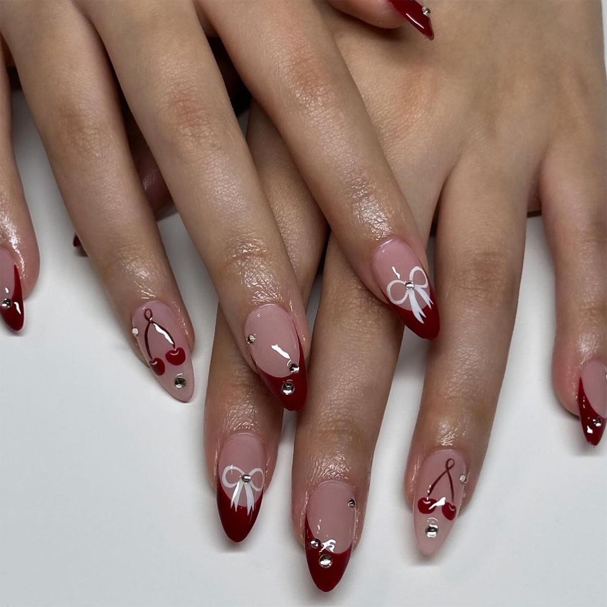 Cherry Blossom Red Almond Nail Tips with Flash Diamond & Bow Design
