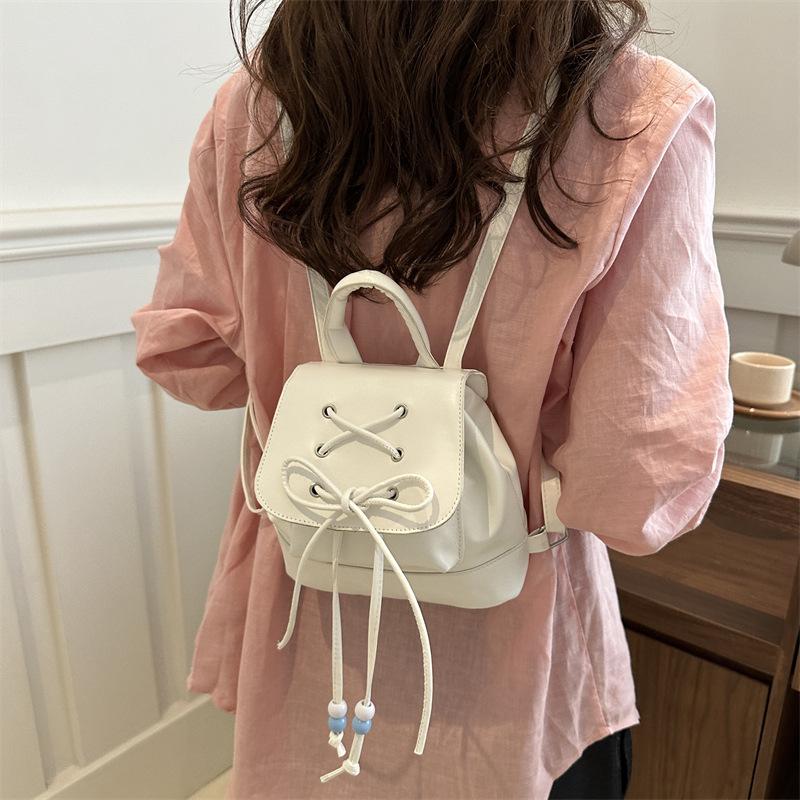 Ballet style bow backpack women 2025 new Internet celebrity portable small backpack go shopping travel small schoolbag