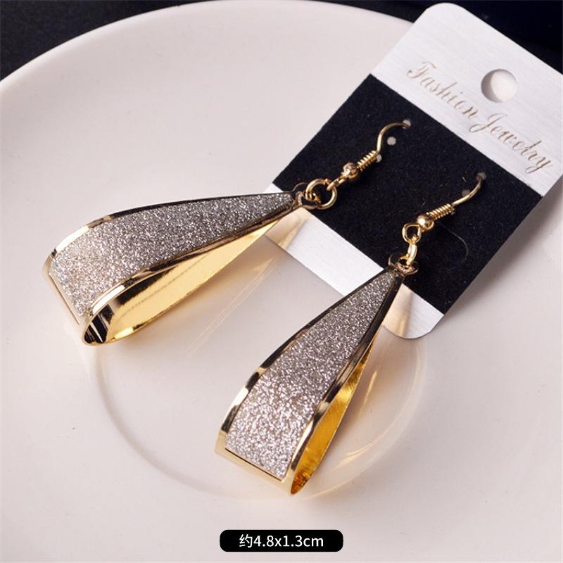 Fashion exaggerated niche temperament fringed earrings retro personality versatile sequined earrings women's long ear jewelry
