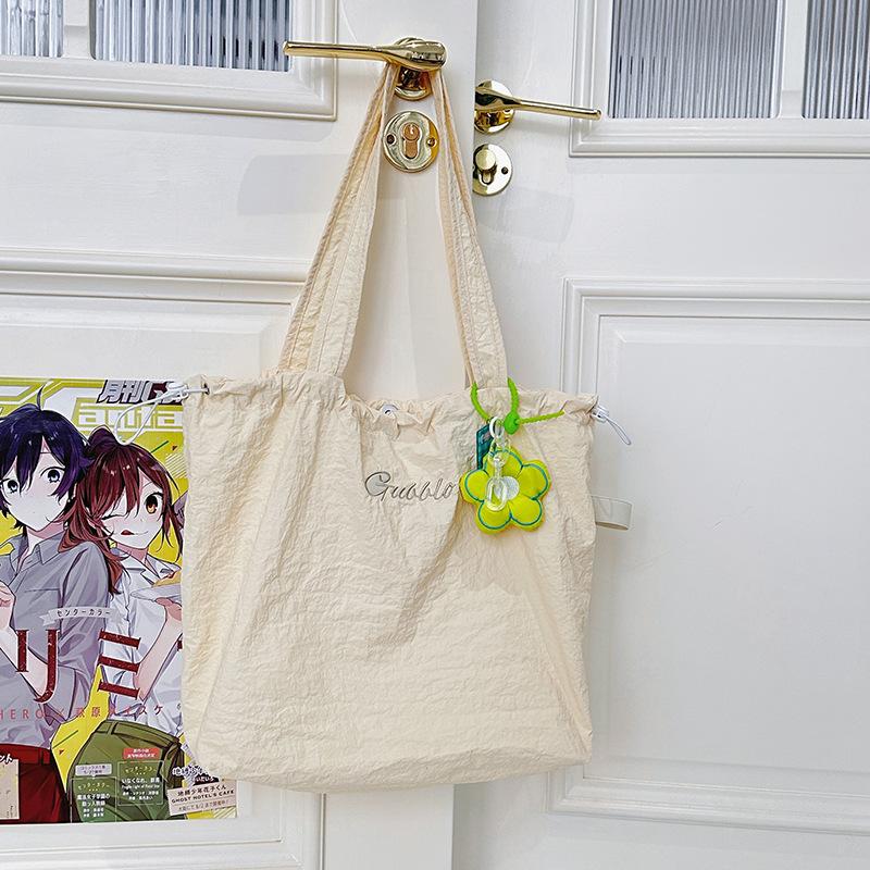 

Korean ins style high value shoulder bag student party large capacity light leisure commuter tote bag simple niche no pendant