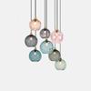 Nordic Embossed Glass Sphere Pendant Light - Colorful Water Ripple Design for Bedroom, Bedside, Restaurant, or Bar.
