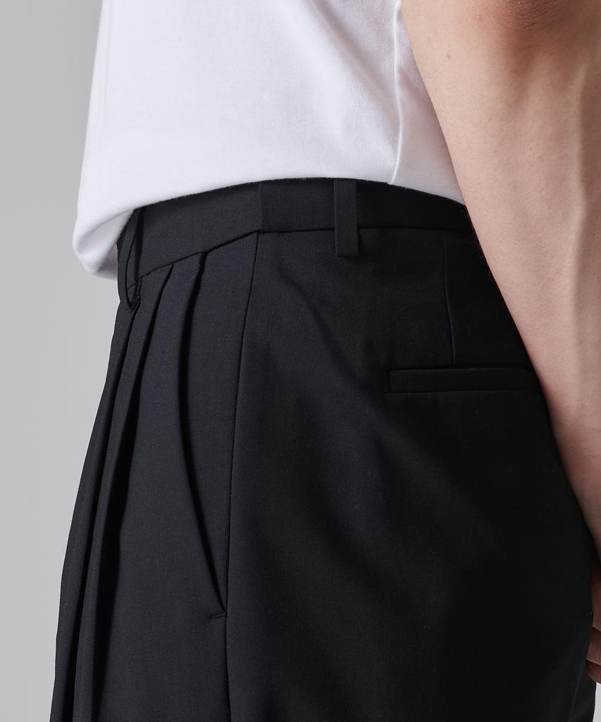 MUSINSA STANDARD Summer Wool Two-Tuck Wide Hidden Elastic Waist Slacks [Black]