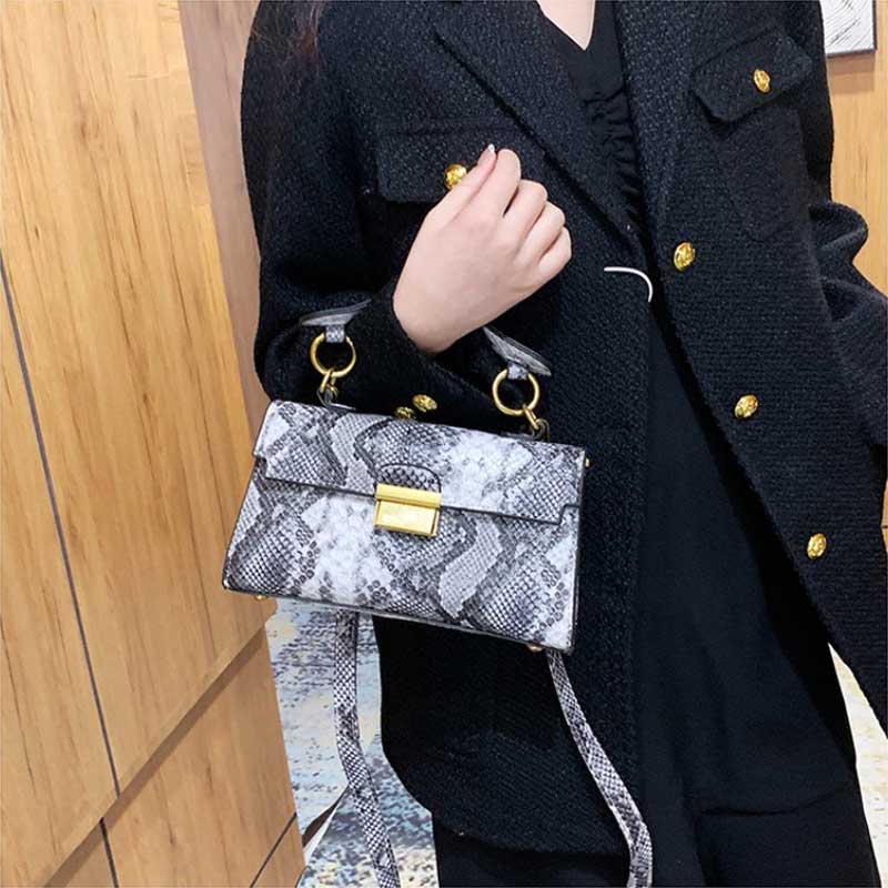 Schoolbag Women's Yellow Luxury Snake Print Niche Design Versatile Handhold Bag Shoulder Bag Crossbody Bag Armpit Fashionable High-End Texture Light