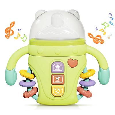 Silicone Baby Bottle Shape Teething Toys, Newborn Light and Music Electric Soother Bottle Can Be Grasped To Bite