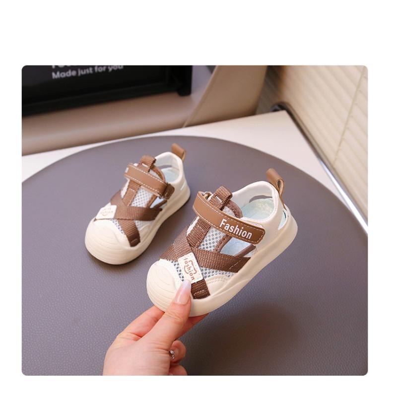 Sandalias para niños nuevo verano niños baotou casual hueco zapatos de playa niños medianos deportivos zapatos de bebé moda