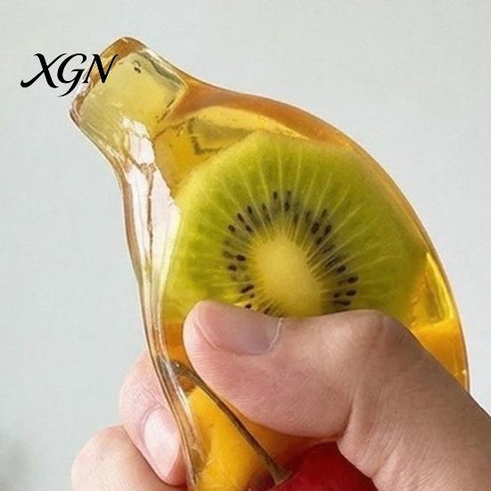 Tension Relief Toys Stress Banana Squeeze Toy, Clear Fake Sensory Improve Desk Gadgets Concentration & Relieve Tension, Soft Stretchy Fruit Fidget Toy