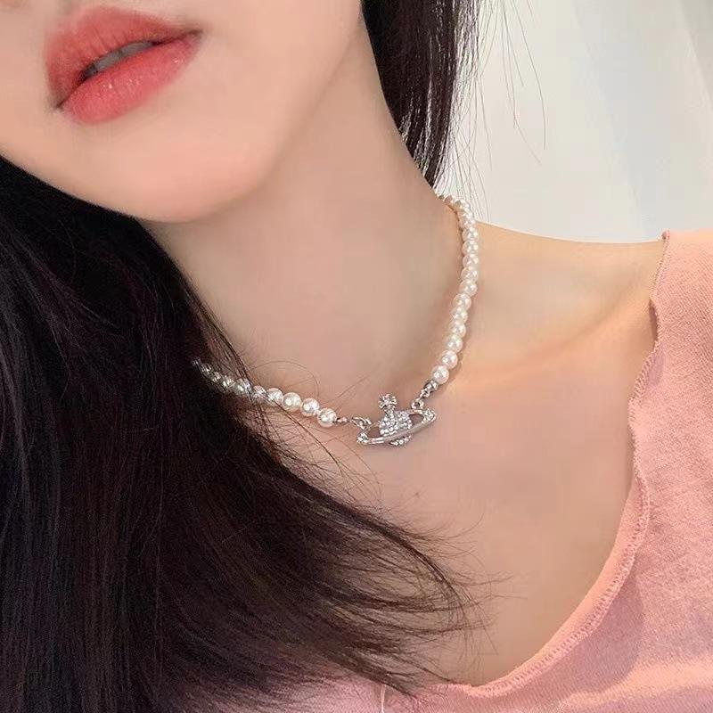 Vivienne Westwood Saturn Pearl Necklace: Women's Luxury Choker with Vivienne's Planet Clavicle Chain