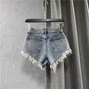 Vintage Low Rise Denim Shorts with Fringe & Ripped Pockets