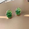 Fresh and elegant crystal earrings in orange, sea blue and green pastel gradient colors. Women's light luxury and fashionable earrings.