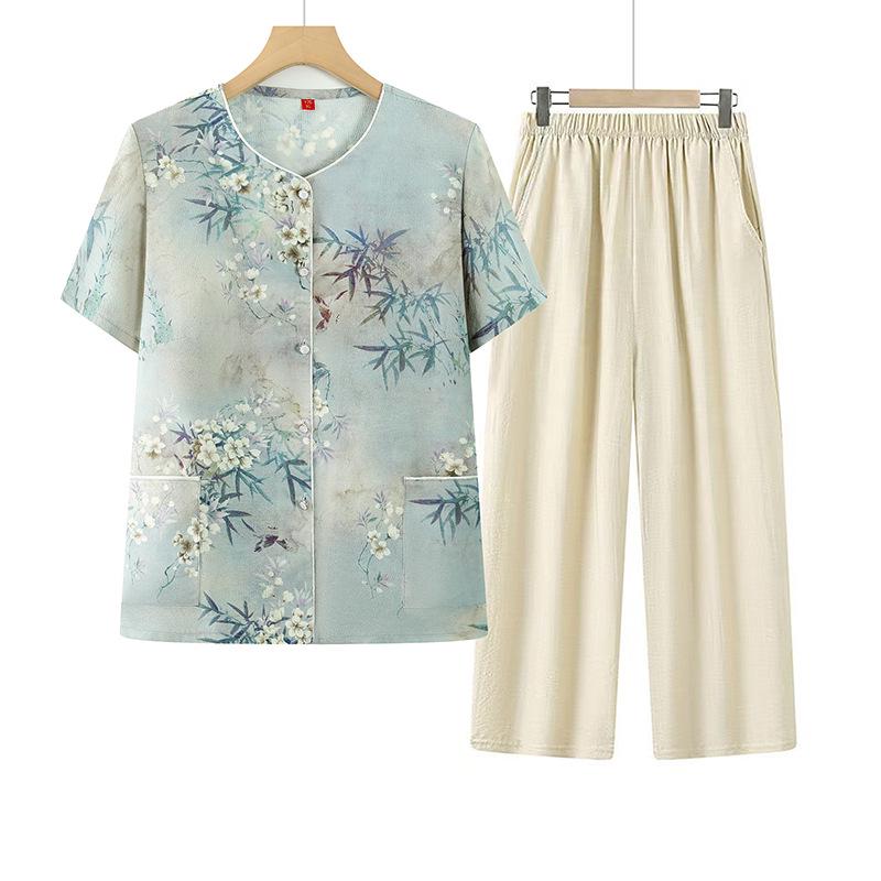 

2026 Summer Embroidered Short Sleeve Suit for Moms: Stylish Plus Size Two-Piece Set for Middle-Aged and Elderly 4XL синій
