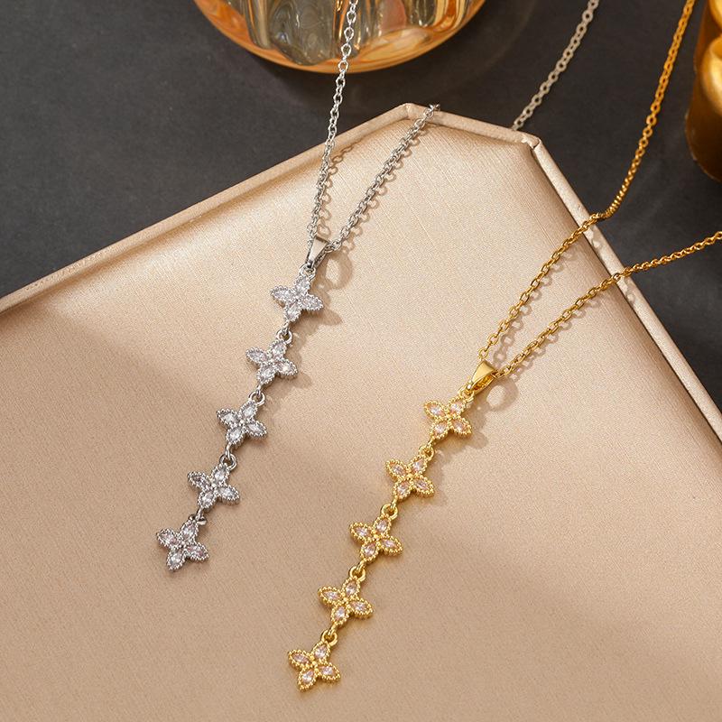 Exquisite Gold-Plated Diamond Four-Leaf Clover Tassel Necklace for Women - Fashionable Titanium Steel Clavicle Chain