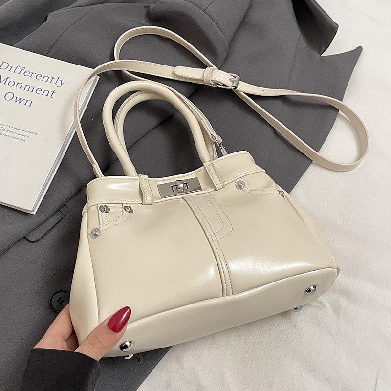 Spring and Summer New French Fashion Commuter Style Portable Bucket Bag Women's Versatile High-quality Foreign Leisure Messenger Bag