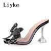 Fashion Liyke Fashion Crystal Sequined Bowknot Women Slippers Sandals Strange Style Clear Heels Open Toe PVC Transparent Shoes Size 46