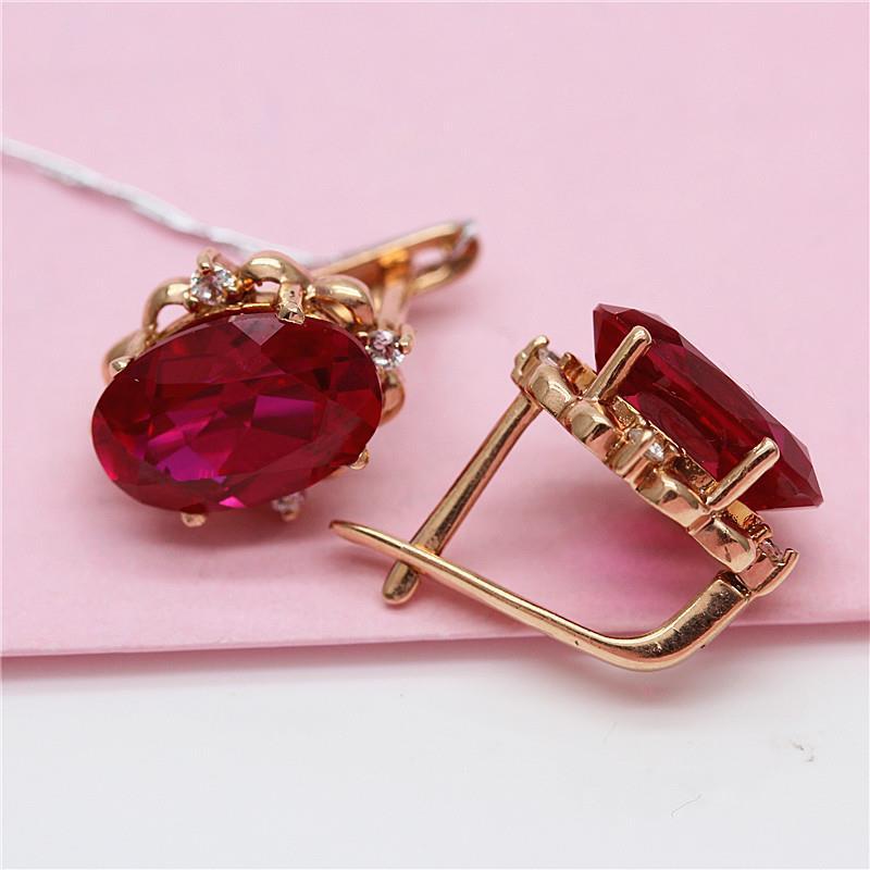 Exquisite Russian 585 Purple Gold Women'S Red Stone Egg Surface Earrings Fashion Temperament Pure Color Gold Plated Rose Gold Earrings