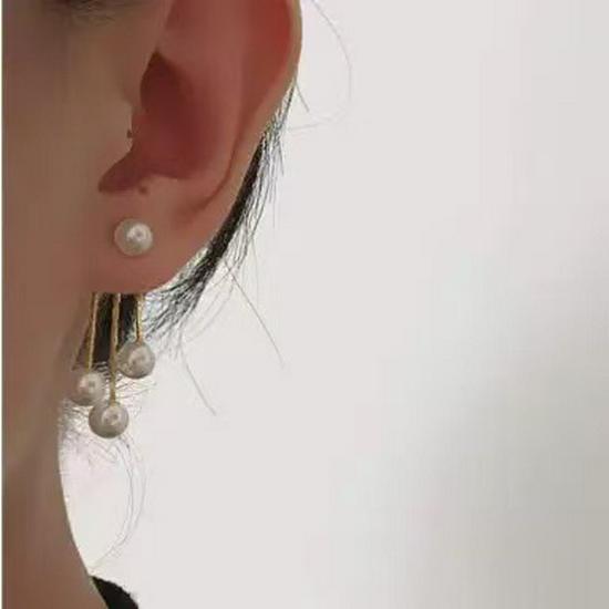

Korean Pearl Tassel Earrings: Retro Niche Design with Two-Way Wear in a Fashionable Style.