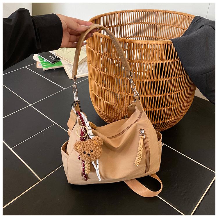

New cloth bag female students class fashion messenger bag large capacity commuter cloth bag simple versatile shoulder bag хакі