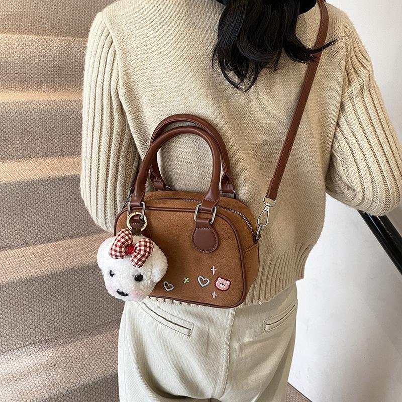 Retro portable bowling bag women's 2025 autumn new fashion texture portable small square bag simple messenger bag