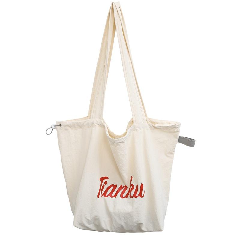 

Slack Tote Bag Women s 2025 New Drawstring Canvas Bag Commuter Light Tote Bag Large Capacity Shoulder Bag белый