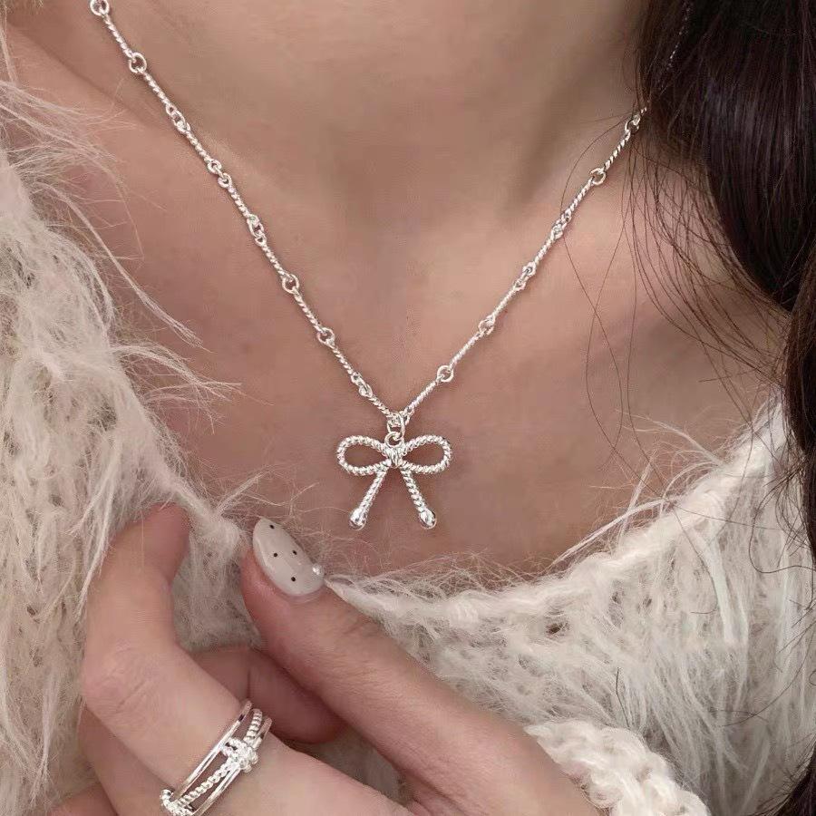 Elegant Silver Bow Knot Necklace: Versatile, Light Luxury Design for Women