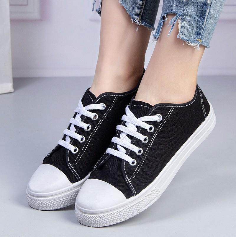 Buty płócienne wiosna i lato nowe niskie studenckie retro czarno-białe buty na desce buty codzienne