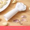Outil Rapide Éplucheur d'Ail Avec Forme Griffe de Chat Rouleau à Éplucher Polyvalent Pour Noix Cacahuète Gadget de Cuisine