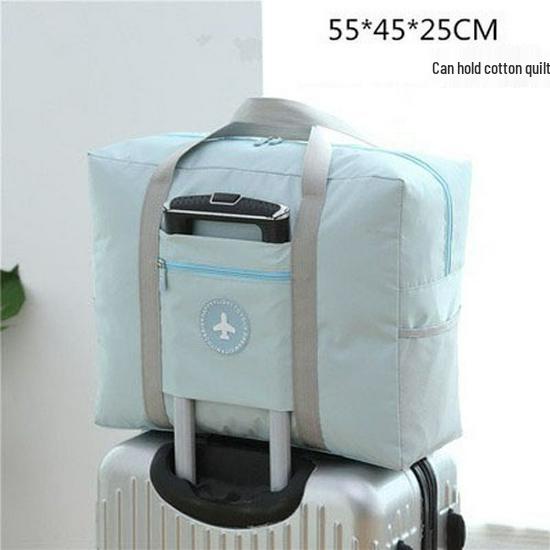 Compact travel bag: suitcase-compatible, hand-held, features an external pocket, handle slip-over design, with matching accessory bag.