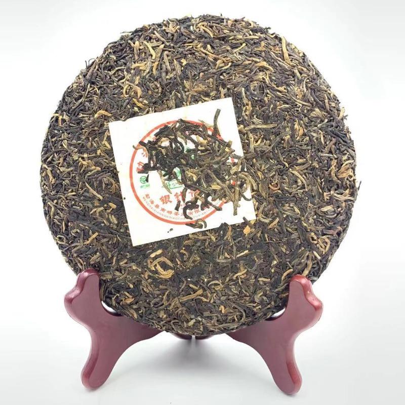 2006 Nanqiao Menghai Árvore Selvagem Chá Agulha de Prata Bolo Tributo Pu'er Cru 250g