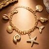 Shell Starfish Bracelet for Women Gold Tone Link Chain with Ocean Tail Detail, Adjustable Wrist Jewelry for Beach Vacation Outfits