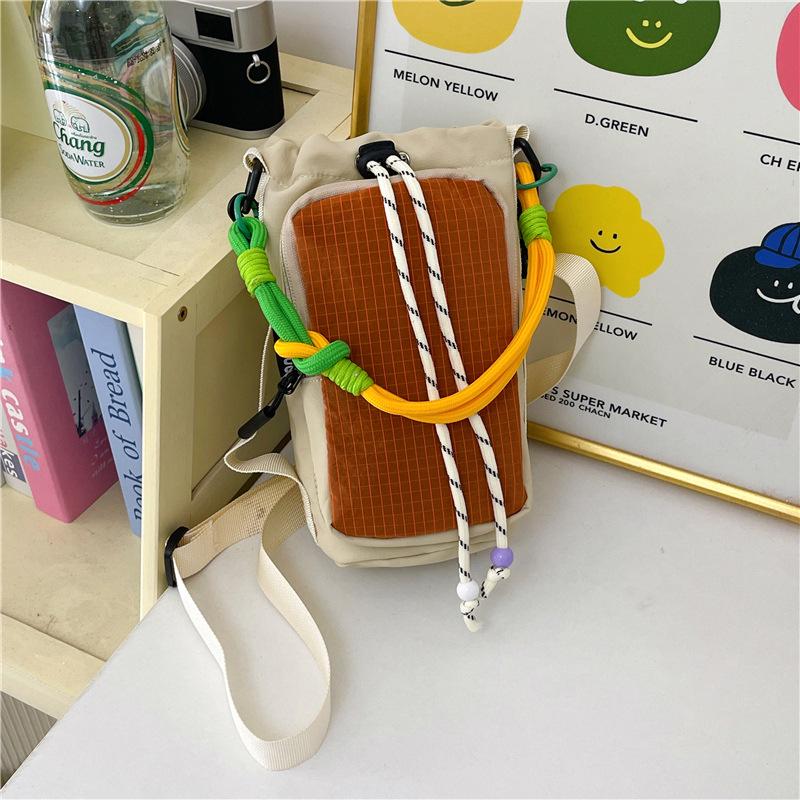 Women's Nylon Color Block One-Shoulder Crossbody Bag with Woven Lanyard, Lightweight and Stylish.