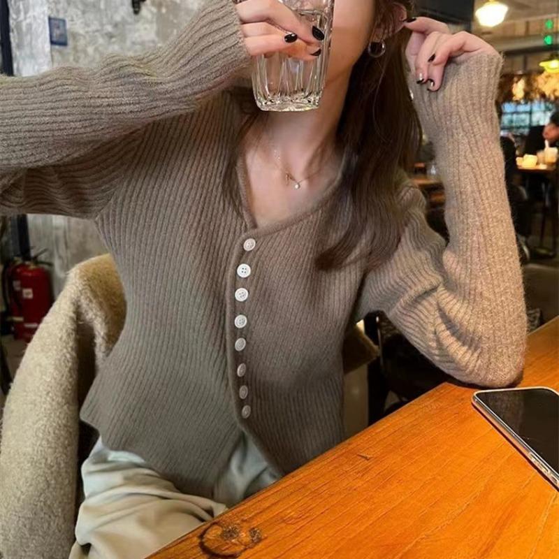 Design sense irregular knitted cardigan top women's autumn and winter new temperament commuting thin inner sweater