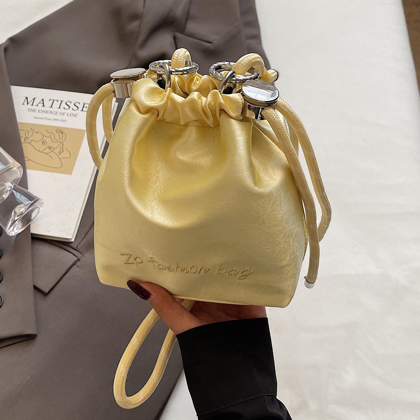 

Casual Letter Embroidered Crossbody Bags for Women Fashi Versatile Mini One Shoulder Bag Simple Drawstring Bucket Handbags Mini(Max Length<20cm)