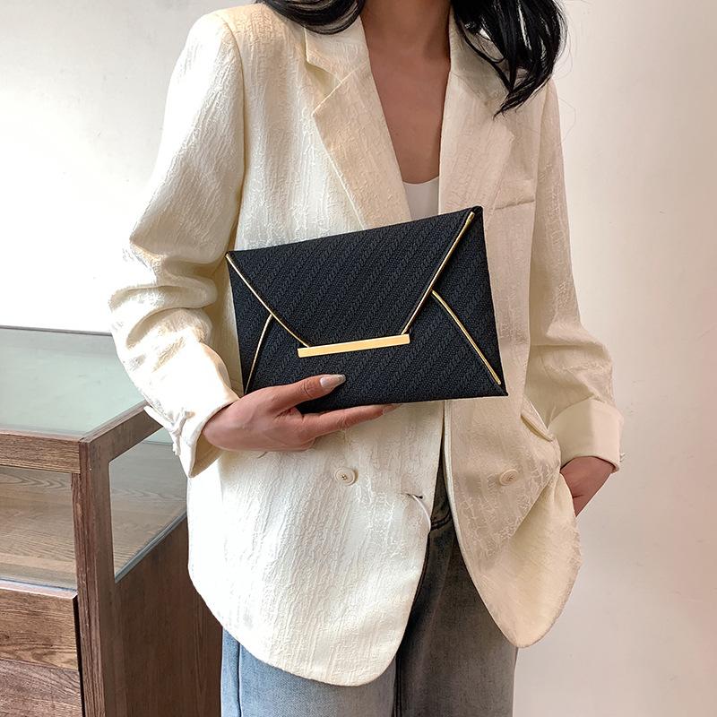 Spring New Simple Hand-held Small Square Bag Envelope New Handbag High-value Niche Design Light Luxury Bag
