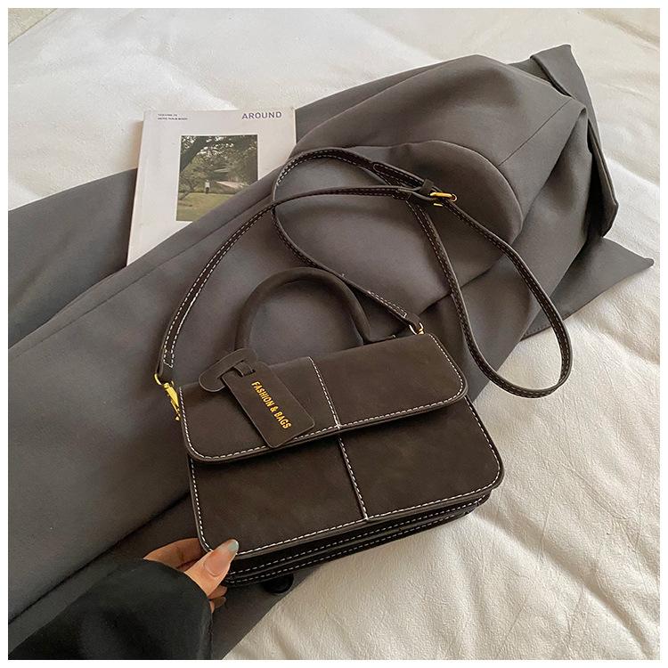 

Niche hand-held small bag women s winter new fashion commuter small square bag high-value shoulder bag