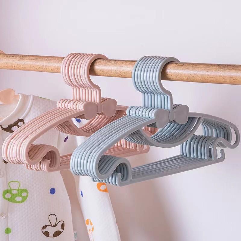 Newborn Clothes Hanger With Plastic Material And Decorative Bow For Baby Room