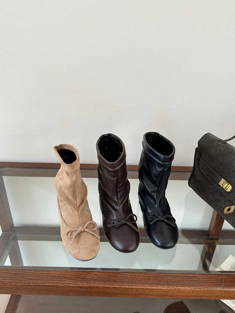 [] Autumn new inner height increase bow elastic boots round head medium boots women's boots