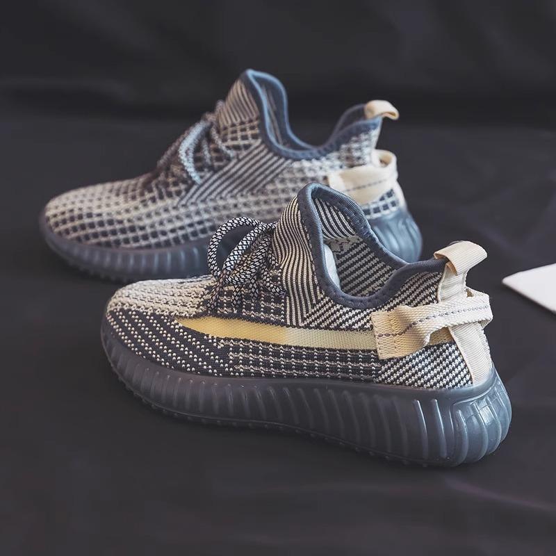 Sapatos tricotados voadores sapatos masculinos e femininos 2025 novos respiráveis estudante versão coreana moda sapatos esportivos casuais respiráveis para corrida fitness