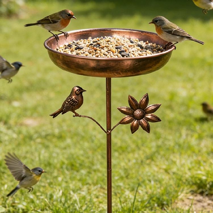 Strong Antique Look Outdoor Bird Bath Providing A Safe Drinking Area For Flying Visitors