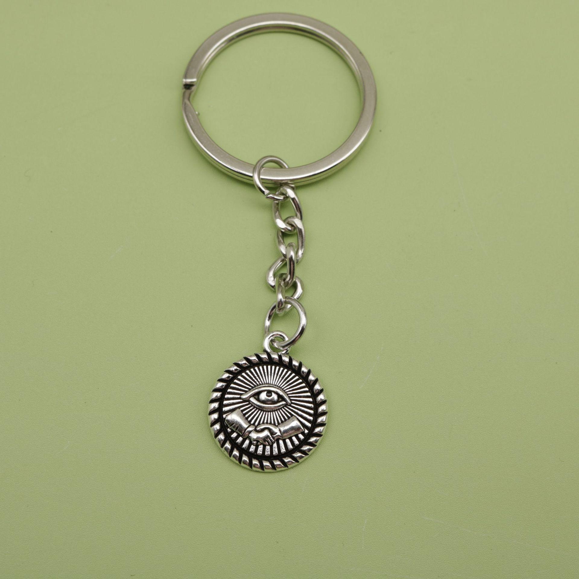 Trending Handshake Eye Keychain Pendant