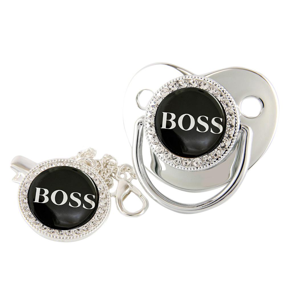 

Золотая соска с бриллиантами и клипсой-цепочкой