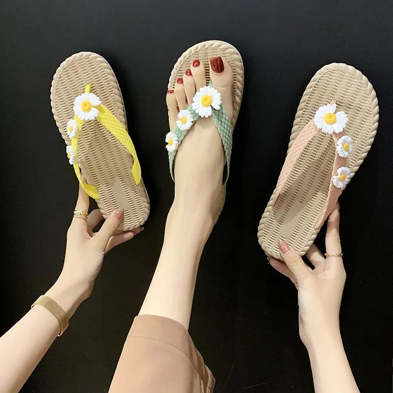 yellow daisy flip flops