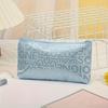1pc Cosmetic Bag with Embossed Letter Design Makeup Organizer Pouch, Durable Travel Toiletry Bag for Women, Makeup Storage with Zipper Closure