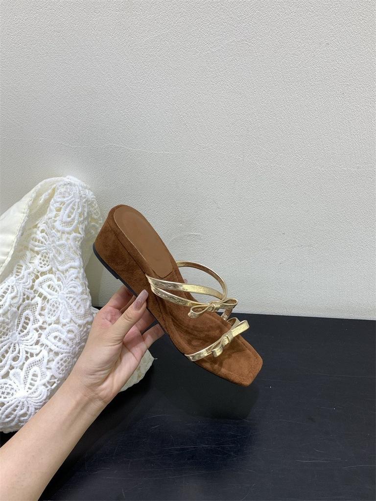French beautiful bow thick-soled cool slippers women's fashion 2025 summer with skirt one-word wedge slippers