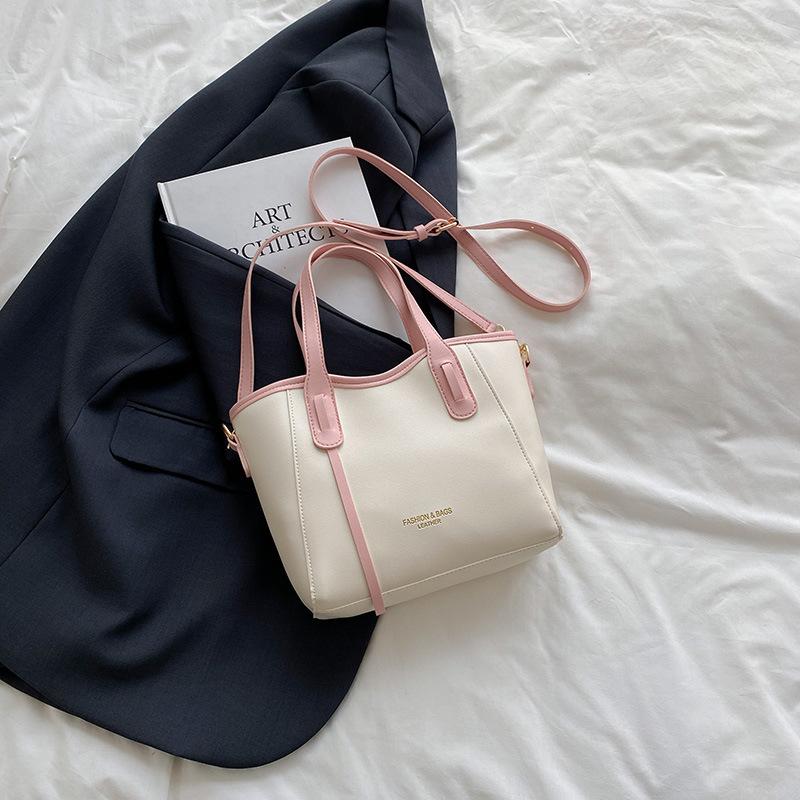 

Bags Women s tote bags Large capacity spring and summer messenger 2025 new fashionable versatile handbags Class commuter bags розовый