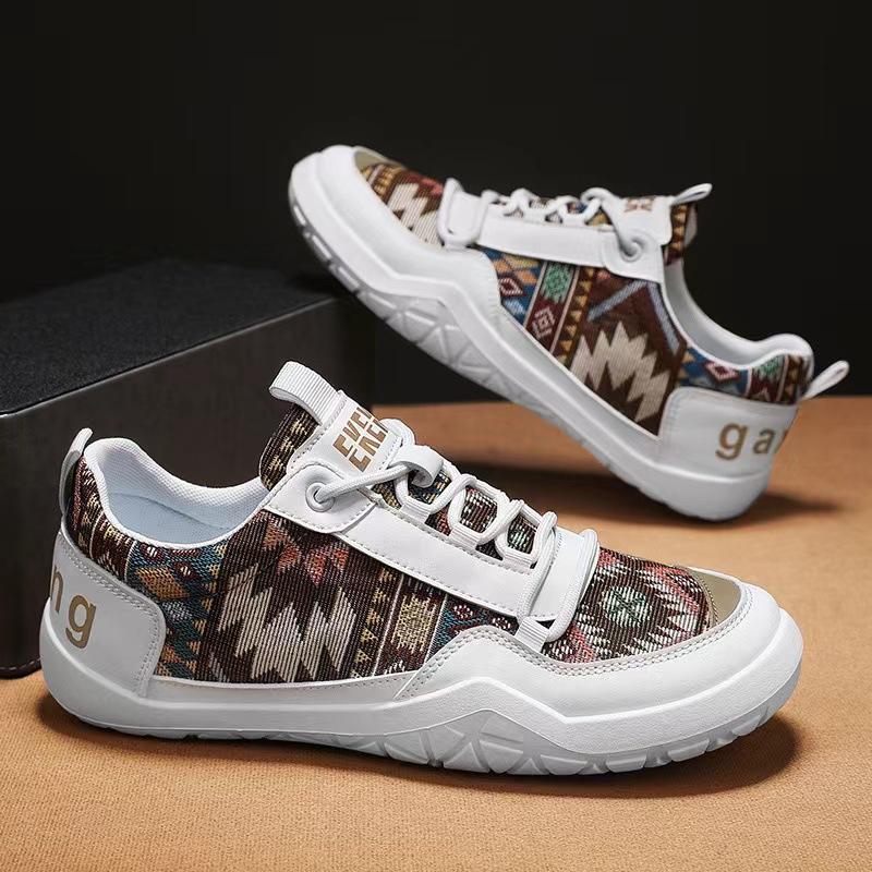 

Дизайнерське взуття чоловіки повсякденне модне кросівки літні дихаючі спортивні полотняні ковзани на плоских підборах молодіжні зручні прогулянкові тенісні туфлі 39