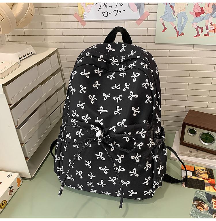Schoolbag bow schoolbag junior high school girls ins style high value 1011 new college students Japanese travel backpack