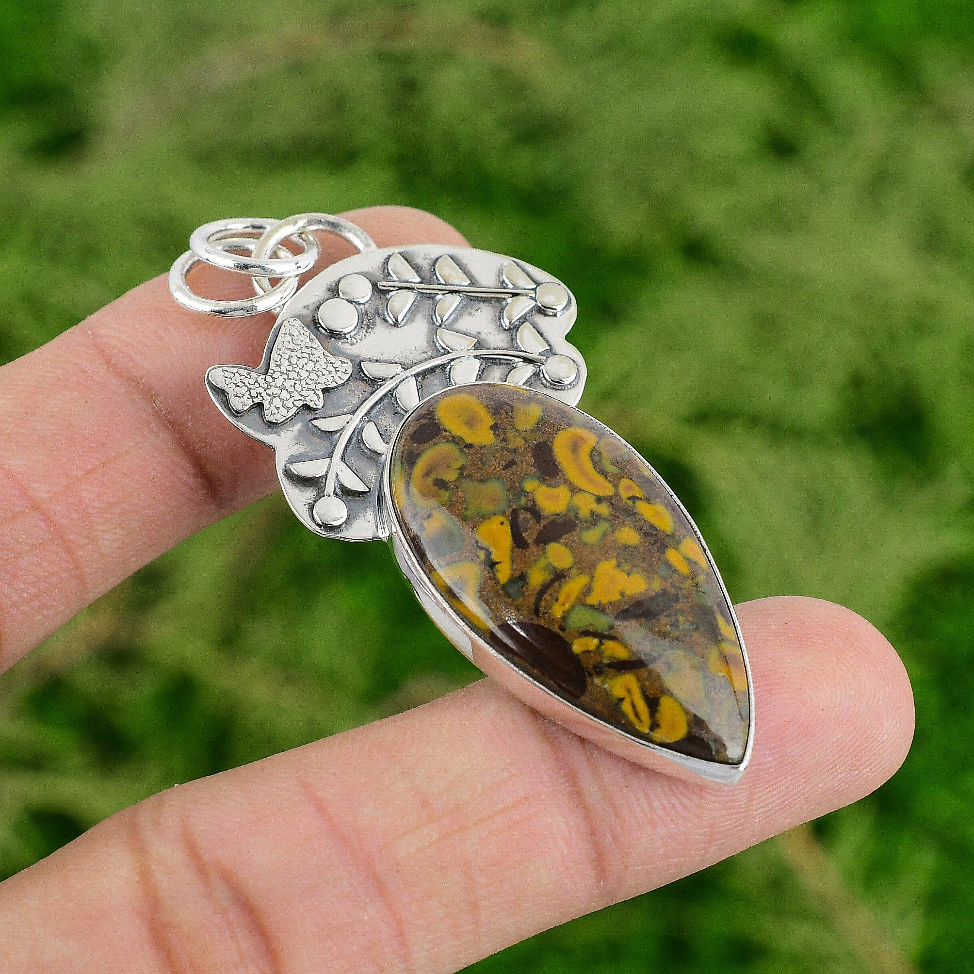 

Грушевидный риолит драгоценный камень Элегантный юбилейный безель Подвеска для сестры Стерлинговое серебро